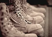 close-up of several military boots