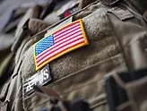 a flag patch on a military uniform