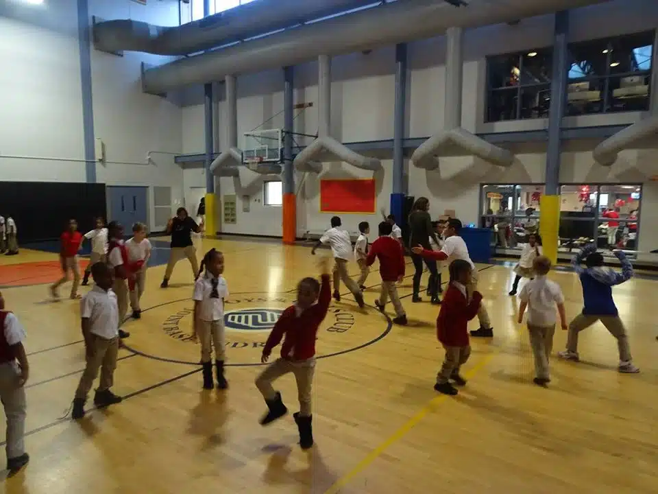 a group of children in a gym